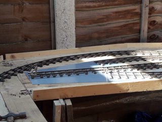 Tom and Glenis in their garden